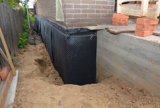Happy homeowners after waterproofing job in Newtonsville